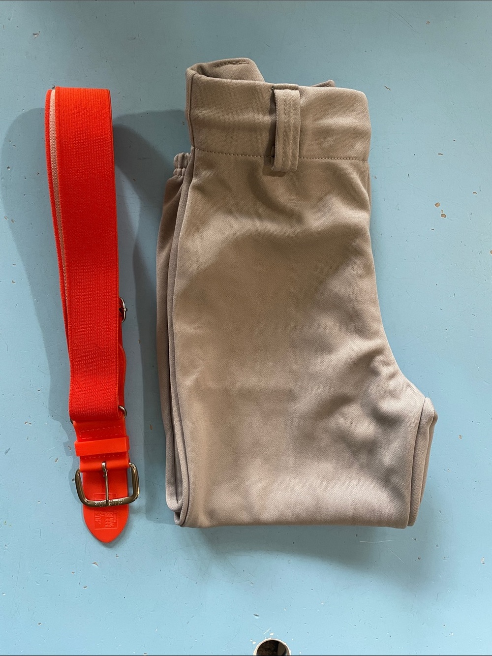 Easton Light Gray Athletic Baseball Pants with orange belt